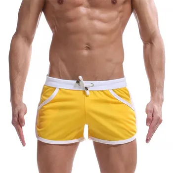 Cel mai bun preț Sănătate sport pantaloni scurți de Plajă de Vară purta noi oamenii de sport pantaloni scurți de moda bărbat femei casual pantaloni scurți Săgeată subțire pantaloni